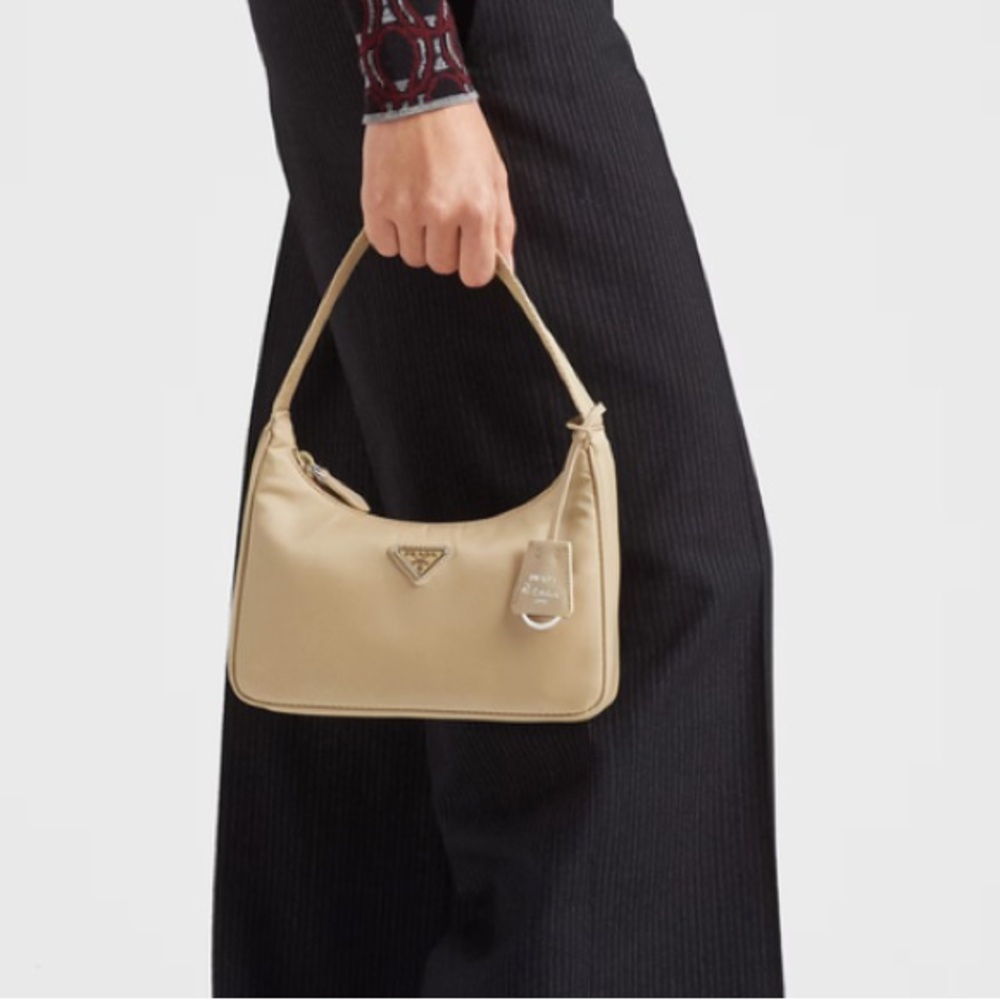 Prada Light Beige Handbag with Silver Emblem and hardware